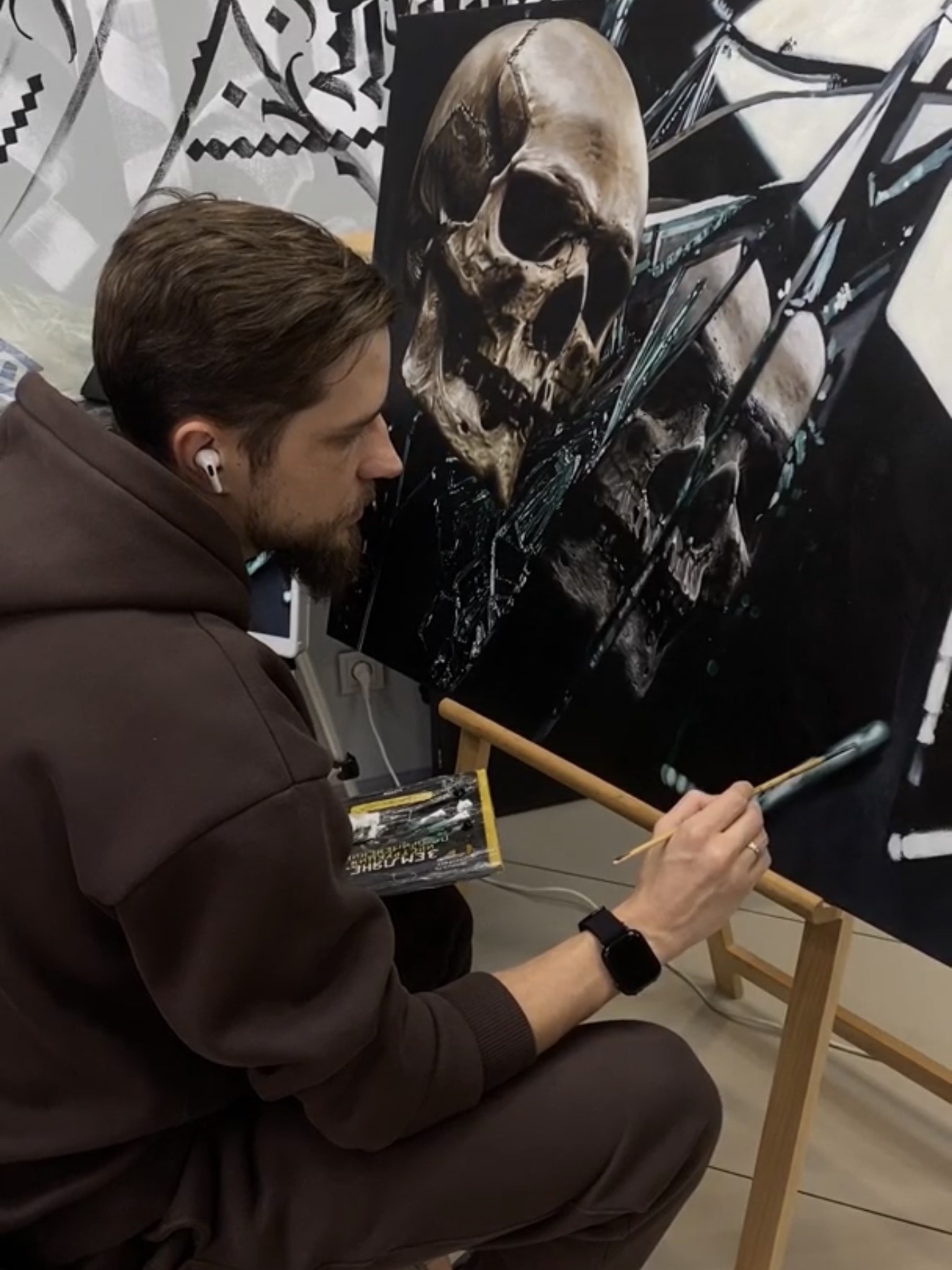 Vladimir Vishar painting a dark realism skull piece